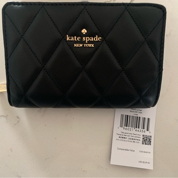 kate spade Handbags - Kate Spade Black Quilted bifold wallet NWT!!